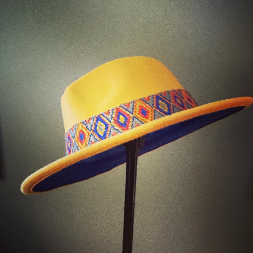 We have over 500 Fedora hats in stock, solid colors as well as two tone.